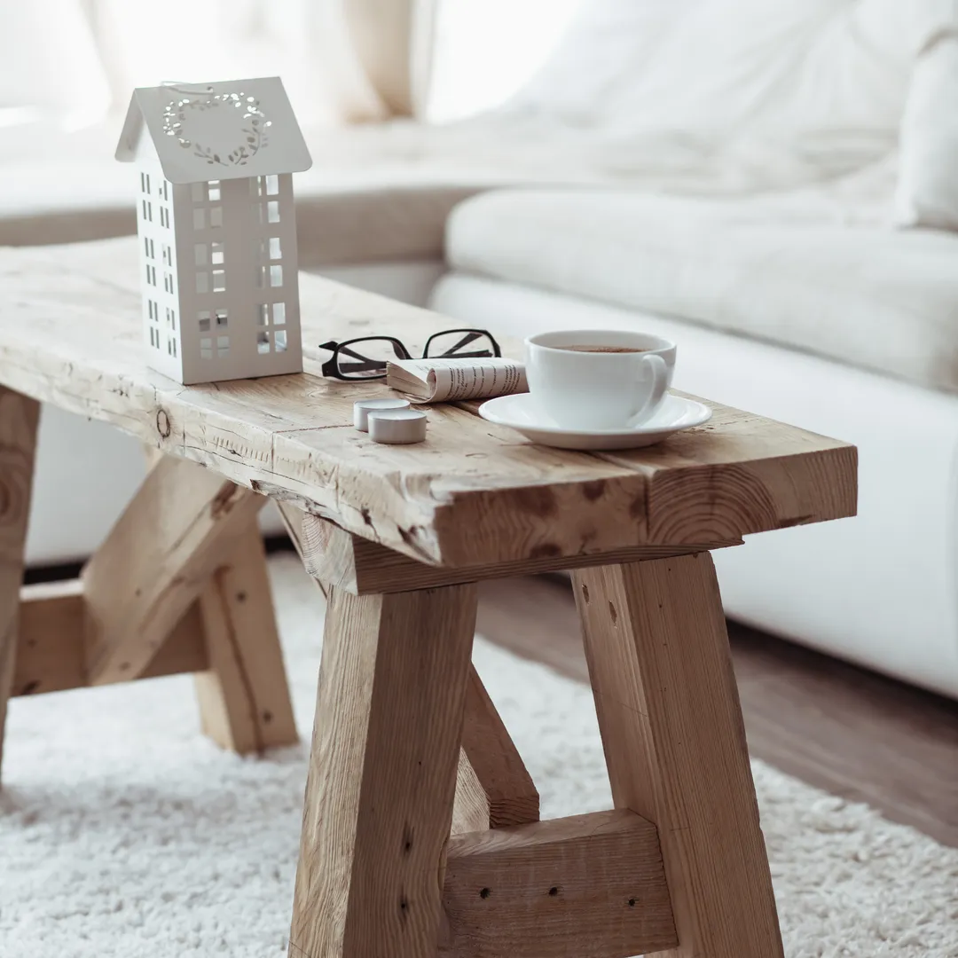 Rustic wooden bench in cosy living room